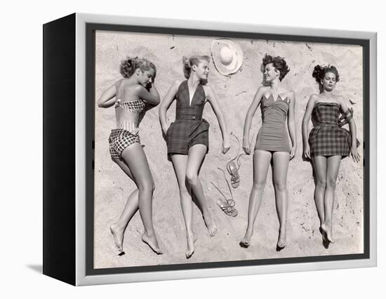 Models Sunbathing, Wearing Latest Beach Fashions-Nina Leen-Framed Premier Image Canvas