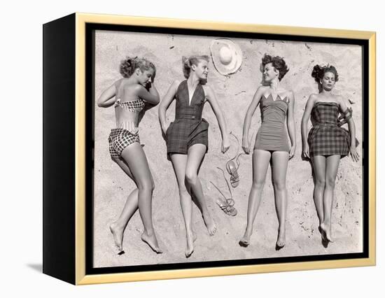 Models Sunbathing, Wearing Latest Beach Fashions-Nina Leen-Framed Premier Image Canvas