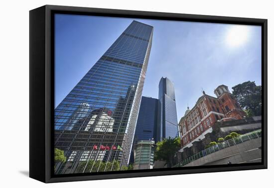 Modern skyscrapers stand next to the colonial Former French Mission Building in Central, Hong Kong-Fraser Hall-Framed Premier Image Canvas