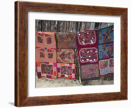 Molas Hanging Up for Sale Outside Thatched House, Isla Tigre, San Blas Islands, Panama-Jane Sweeney-Framed Photographic Print