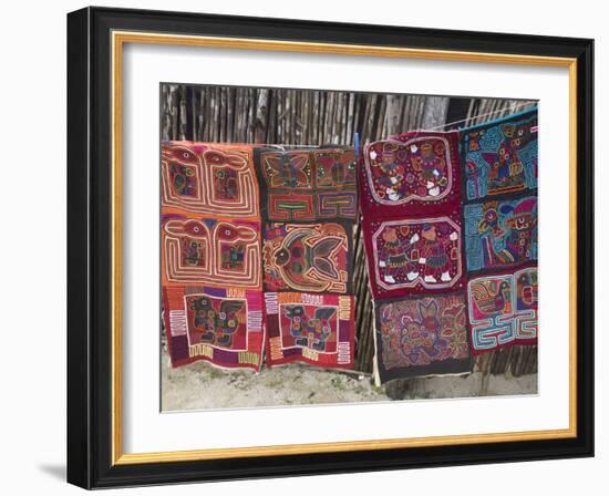 Molas Hanging Up for Sale Outside Thatched House, Isla Tigre, San Blas Islands, Panama-Jane Sweeney-Framed Photographic Print