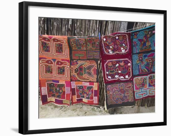 Molas Hanging Up for Sale Outside Thatched House, Isla Tigre, San Blas Islands, Panama-Jane Sweeney-Framed Photographic Print