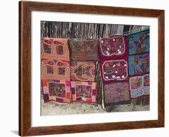 Molas Hanging Up for Sale Outside Thatched House, Isla Tigre, San Blas Islands, Panama-Jane Sweeney-Framed Photographic Print