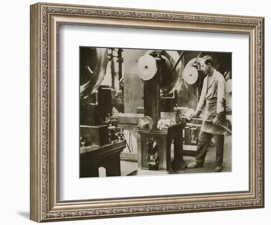 Money making; cutting strips of silver into disks, 20th century-Unknown-Framed Photographic Print