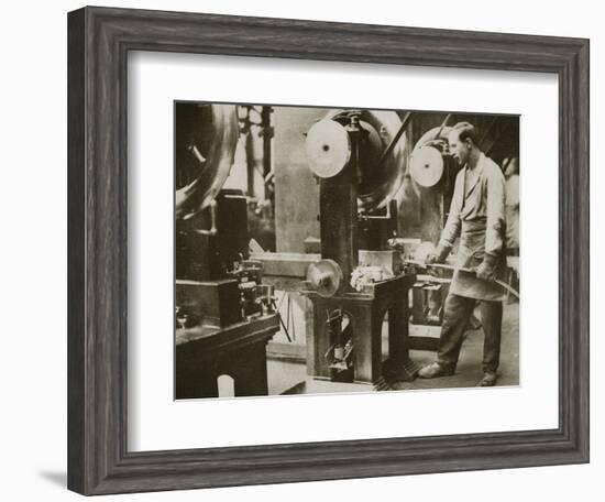 Money making; cutting strips of silver into disks, 20th century-Unknown-Framed Photographic Print