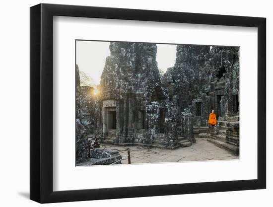 Monk Sitting Sitting in the Bayon Temple, Angkor, Siem Reap, Cambodia, Indochina-Jordan Banks-Framed Photographic Print