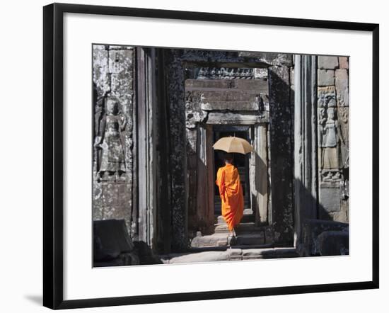 Monk with Buddhist Statues in Banteay Kdei, Cambodia-Keren Su-Framed Photographic Print