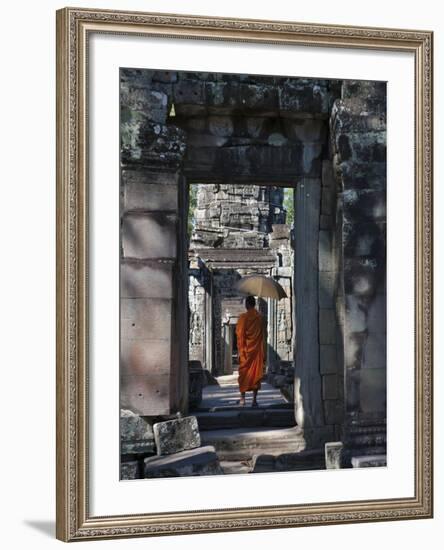 Monk with Buddhist Statues in Banteay Kdei, Cambodia-Keren Su-Framed Photographic Print