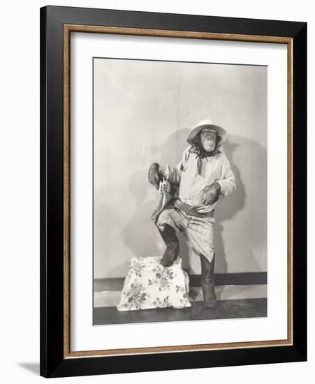 Monkey Dressed Up Like a Cowboy-null-Framed Photo