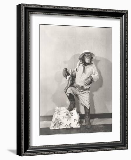 Monkey Dressed Up Like a Cowboy-null-Framed Photo