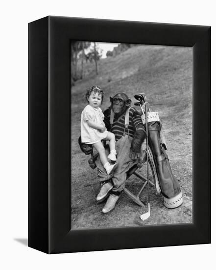 Monkey with Golf Clubs and Toddler Girl-null-Framed Stretched Canvas