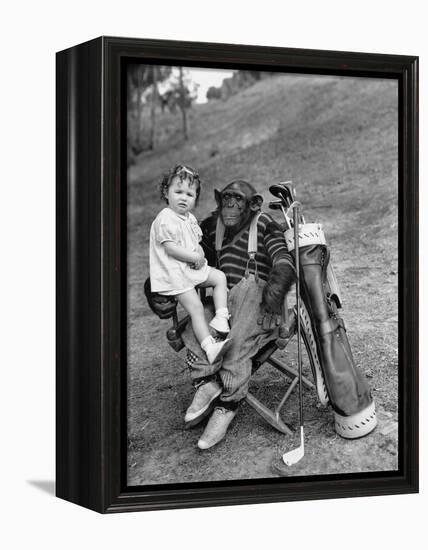 Monkey with Golf Clubs and Toddler Girl-null-Framed Stretched Canvas