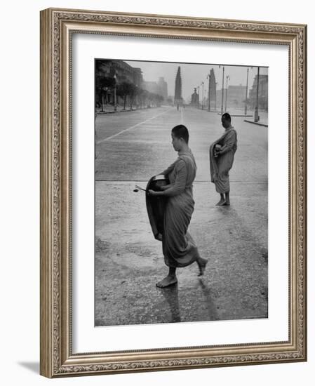 Monks Begging For Food at Dawn on Main Thoroughfare of Bangkok-Howard Sochurek-Framed Photographic Print