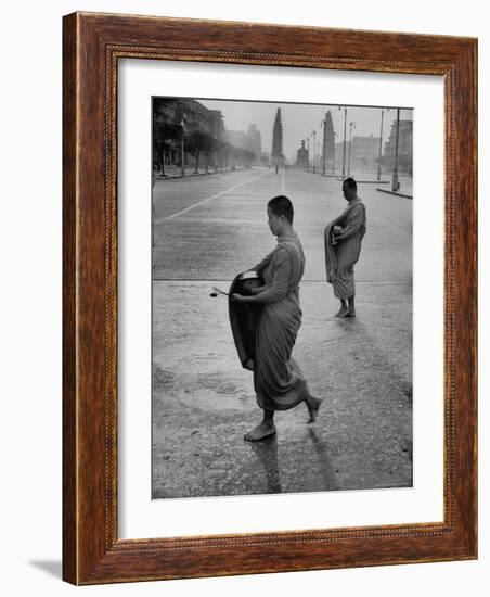 Monks Begging For Food at Dawn on Main Thoroughfare of Bangkok-Howard Sochurek-Framed Photographic Print