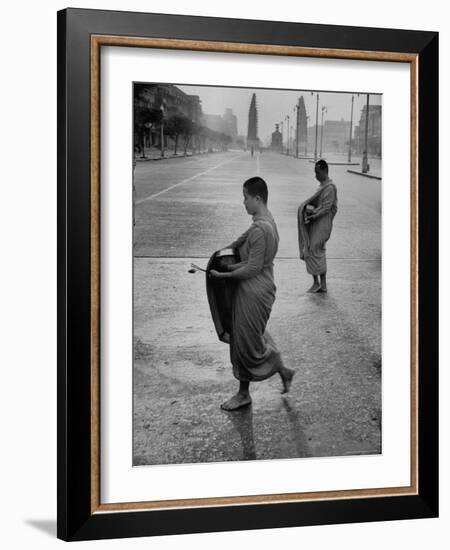 Monks Begging For Food at Dawn on Main Thoroughfare of Bangkok-Howard Sochurek-Framed Photographic Print