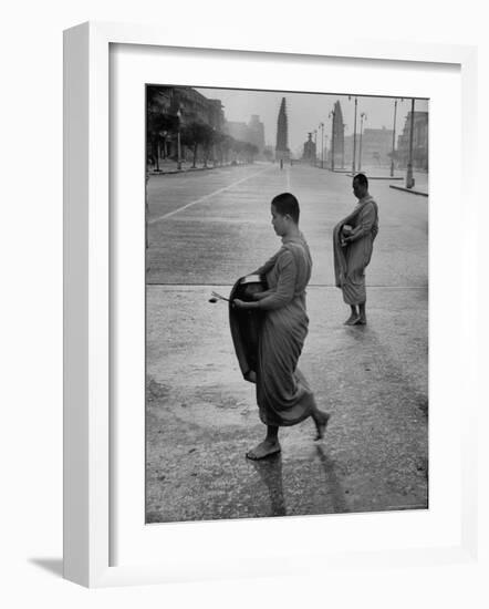 Monks Begging For Food at Dawn on Main Thoroughfare of Bangkok-Howard Sochurek-Framed Photographic Print