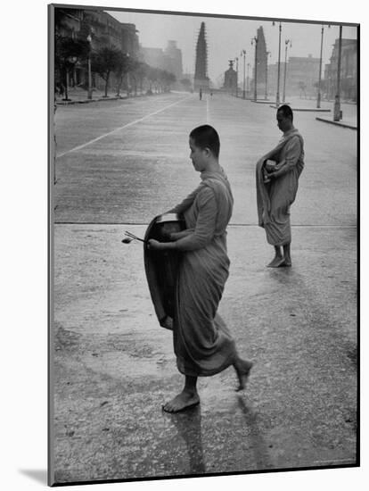 Monks Begging For Food at Dawn on Main Thoroughfare of Bangkok-Howard Sochurek-Mounted Photographic Print