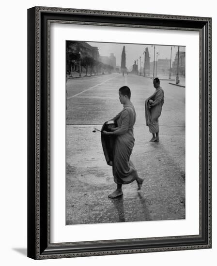 Monks Begging For Food at Dawn on Main Thoroughfare of Bangkok-Howard Sochurek-Framed Photographic Print