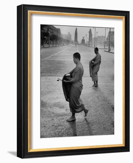 Monks Begging For Food at Dawn on Main Thoroughfare of Bangkok-Howard Sochurek-Framed Photographic Print