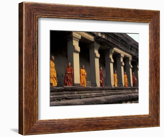 Monks Behind the Columns of the Gallery at Angkor Wat, Siem Reap, Cambodia-Keren Su-Framed Photographic Print