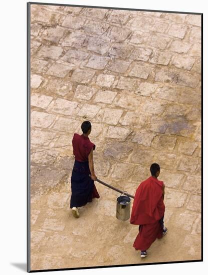 Monks Carrying Yak Butter, Ganden Monastery, Tagtse County, Tibet-Michele Falzone-Mounted Photographic Print