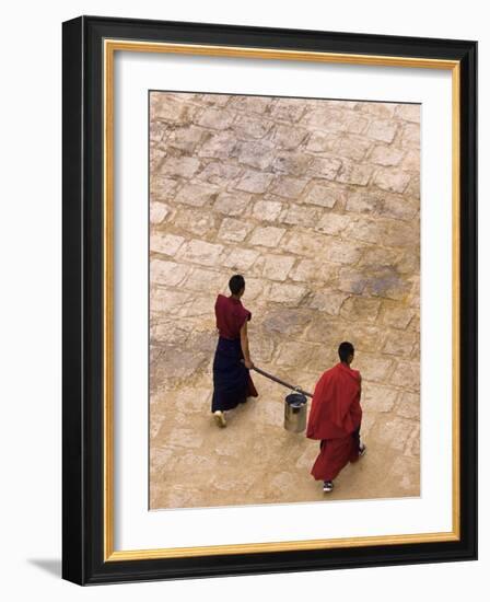 Monks Carrying Yak Butter, Ganden Monastery, Tagtse County, Tibet-Michele Falzone-Framed Photographic Print