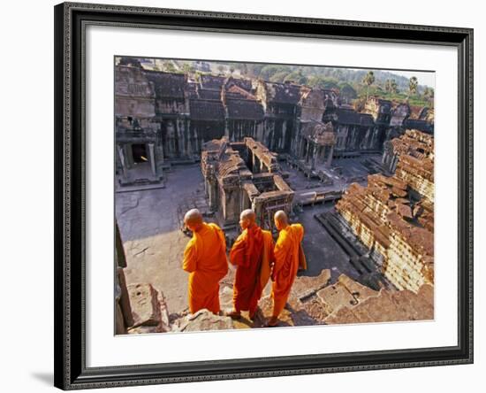 Monks Overlook Angkor Wat, Cambodia-Tom Haseltine-Framed Photographic Print