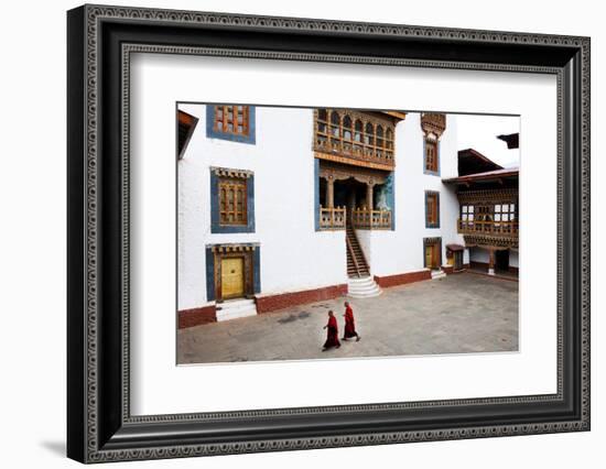 Monks Walking Through the Courtyard of Punakha Dzong, Punakha District, Bhutan, Asia-Jordan Banks-Framed Photographic Print