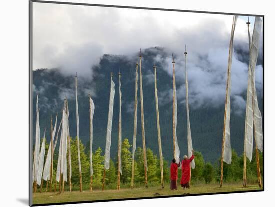 Monks with Praying Flags, Phobjikha Valley, Gangtey Village, Bhutan-Keren Su-Mounted Photographic Print