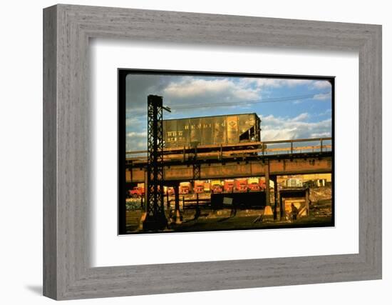 Moody Sunlight Showing Hopper Car of the Reading Railroad Idle on Rusting Elevated Span-Walker Evans-Framed Photographic Print