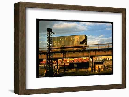 Moody Sunlight Showing Hopper Car of the Reading Railroad Idle on Rusting Elevated Span-Walker Evans-Framed Photographic Print