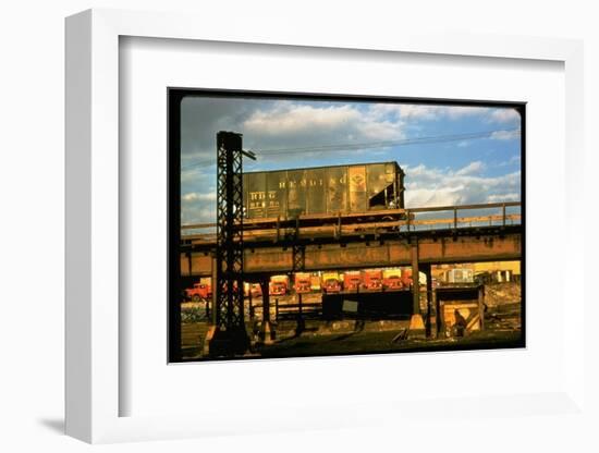 Moody Sunlight Showing Hopper Car of the Reading Railroad Idle on Rusting Elevated Span-Walker Evans-Framed Photographic Print