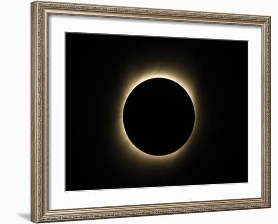 Moon Passes Between the Sun and the Earth During a Total Solar Eclipse in Varanasi, India-null-Framed Photographic Print