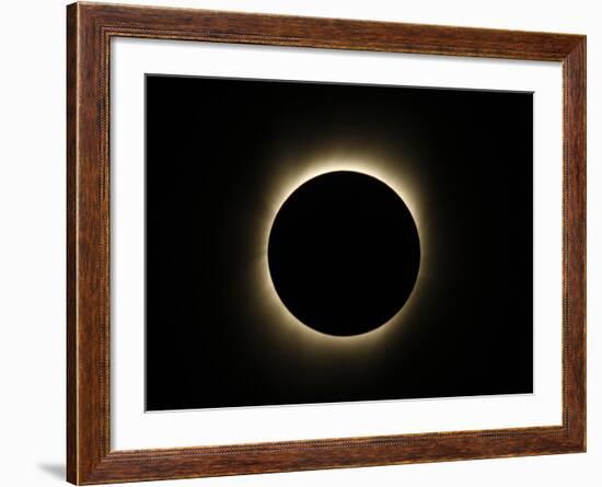 Moon Passes Between the Sun and the Earth During a Total Solar Eclipse in Varanasi, India-null-Framed Photographic Print