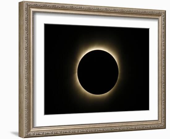 Moon Passes Between the Sun and the Earth During a Total Solar Eclipse in Varanasi, India-null-Framed Photographic Print