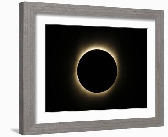 Moon Passes Between the Sun and the Earth During a Total Solar Eclipse in Varanasi, India-null-Framed Photographic Print