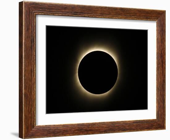 Moon Passes Between the Sun and the Earth During a Total Solar Eclipse in Varanasi, India-null-Framed Photographic Print