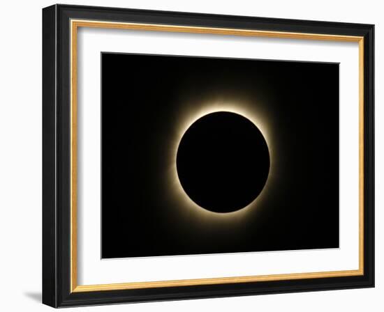 Moon Passes Between the Sun and the Earth During a Total Solar Eclipse in Varanasi, India-null-Framed Photographic Print