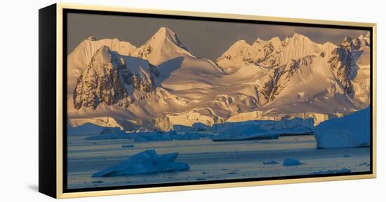 Morning light shines on the mountains and Icebergs, Antarctica-Art Wolfe-Framed Premier Image Canvas