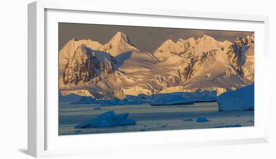 Morning light shines on the mountains and Icebergs, Antarctica-Art Wolfe-Framed Photographic Print