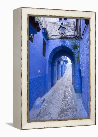 Morocco. A blue alley in the hill town of Chefchaouen.-Brenda Tharp-Framed Premier Image Canvas