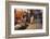 Morocco. An elderly man walks past tourist shops along a street in the blue city of Chefchaouen.-Brenda Tharp-Framed Photographic Print