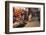 Morocco. An elderly man walks past tourist shops along a street in the blue city of Chefchaouen.-Brenda Tharp-Framed Photographic Print