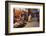 Morocco. An elderly man walks past tourist shops along a street in the blue city of Chefchaouen.-Brenda Tharp-Framed Photographic Print