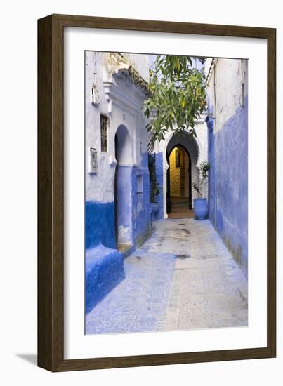 Morocco, Chaouen. Narrow Street Lined with Blue Buildings-Emily Wilson-Framed Photographic Print
