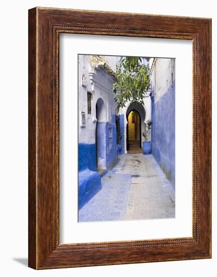 Morocco, Chaouen. Narrow Street Lined with Blue Buildings-Emily Wilson-Framed Photographic Print