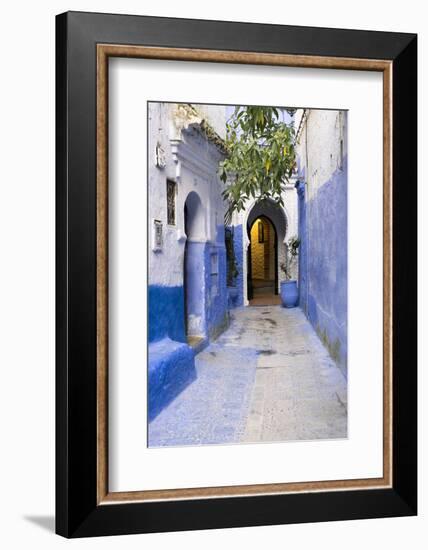 Morocco, Chaouen. Narrow Street Lined with Blue Buildings-Emily Wilson-Framed Photographic Print