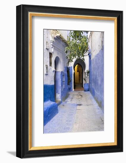 Morocco, Chaouen. Narrow Street Lined with Blue Buildings-Emily Wilson-Framed Photographic Print