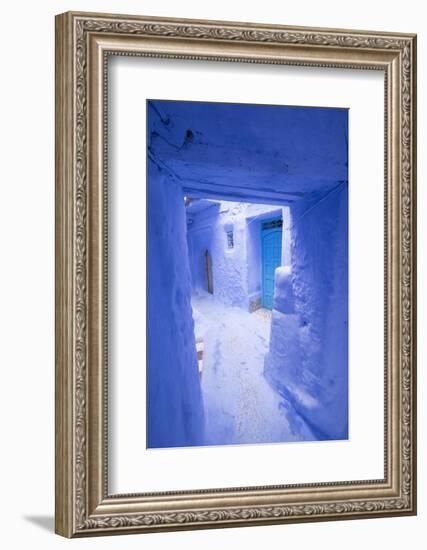 Morocco, Chaouen. Narrow Street Lined with Blue Buildings-Emily Wilson-Framed Photographic Print