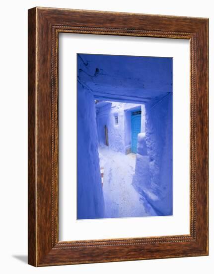 Morocco, Chaouen. Narrow Street Lined with Blue Buildings-Emily Wilson-Framed Photographic Print